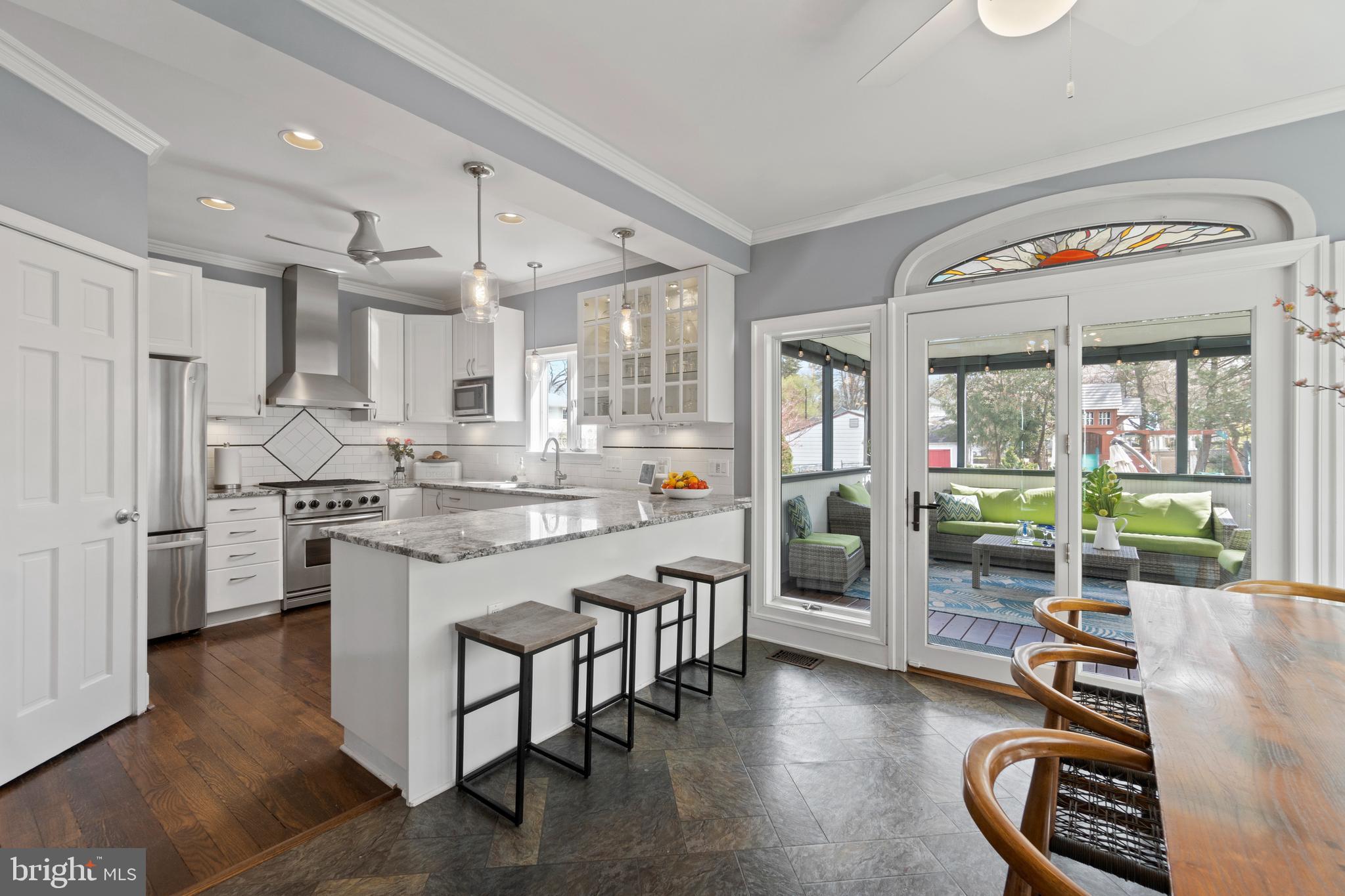 9409 Warren Street Silver Spring, MD 20910 - Photo 15 of 43 Easy entertaining with this porch/dining combo
