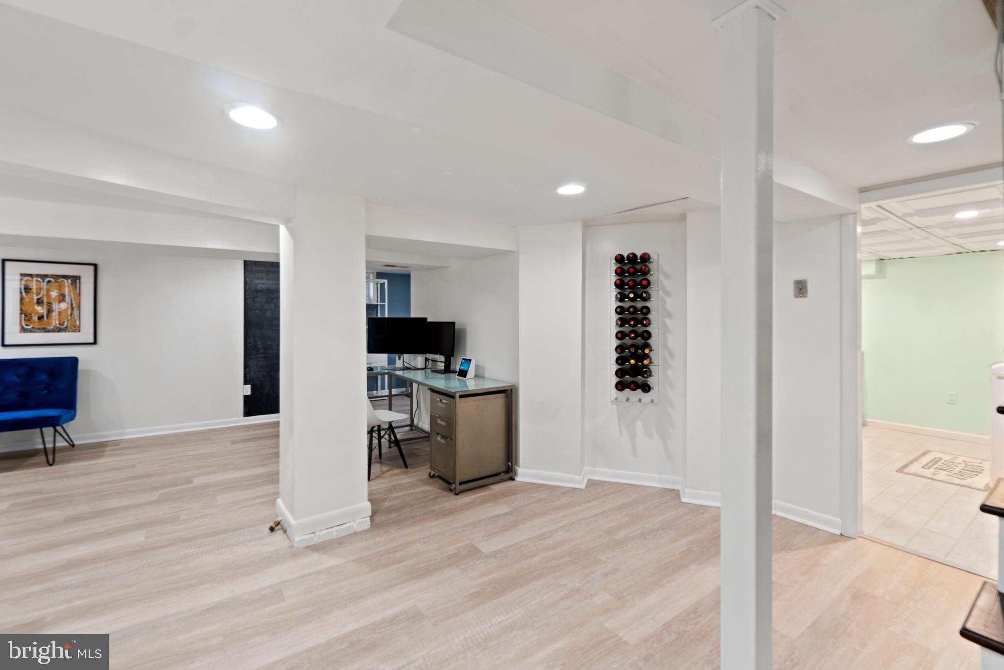 9409 Warren Street Silver Spring, MD 20910 - Photo 33 of 43 Walkout basement with large laundry and workshop
