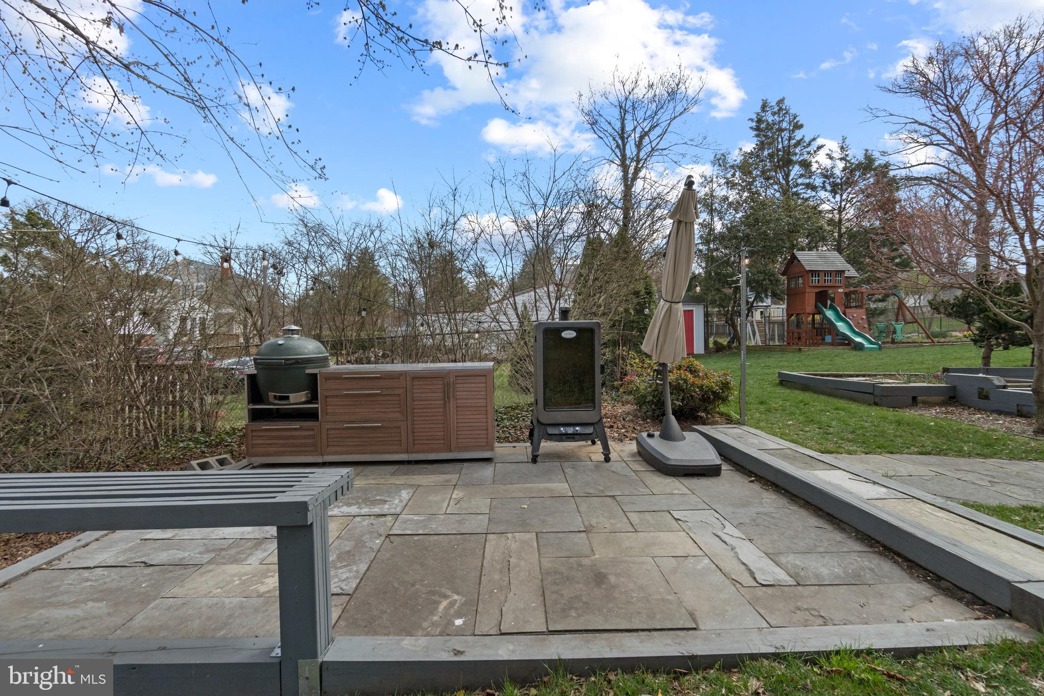 9409 Warren Street Silver Spring, MD 20910 - Photo 39 of 43 BBQ patio is very private when the bushes leaf out