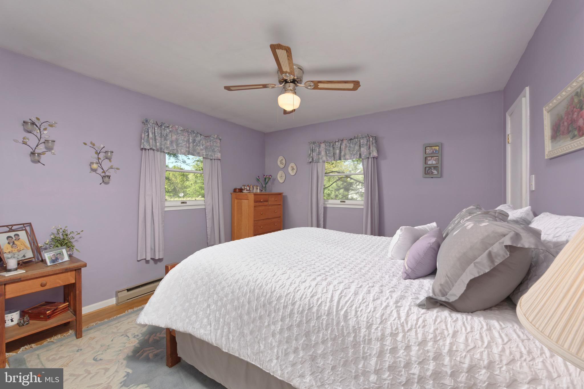 21088 Unison Road Middleburg, VA 20117 - Photo 11 of 66 a bedroom with a bed and a window