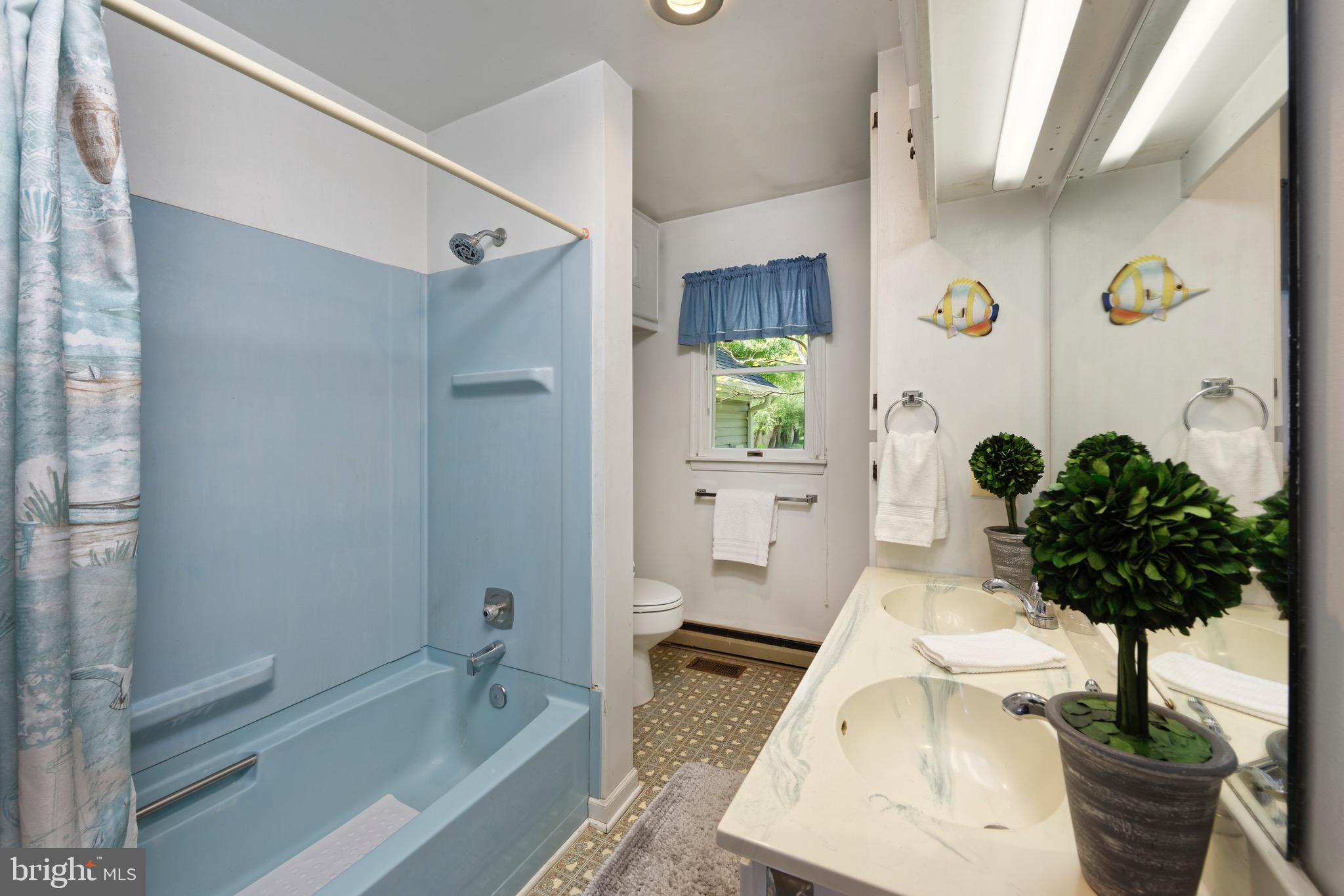 21088 Unison Road Middleburg, VA 20117 - Photo 12 of 66 a bath room with a bathtub and a shower