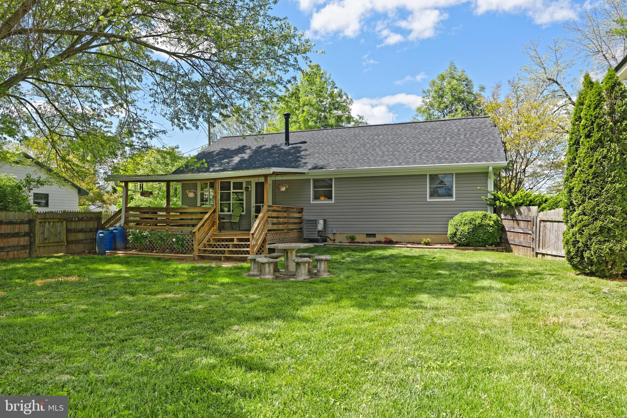21088 Unison Road Middleburg, VA 20117 - Photo 17 of 66 View of the back of the house with rear deck