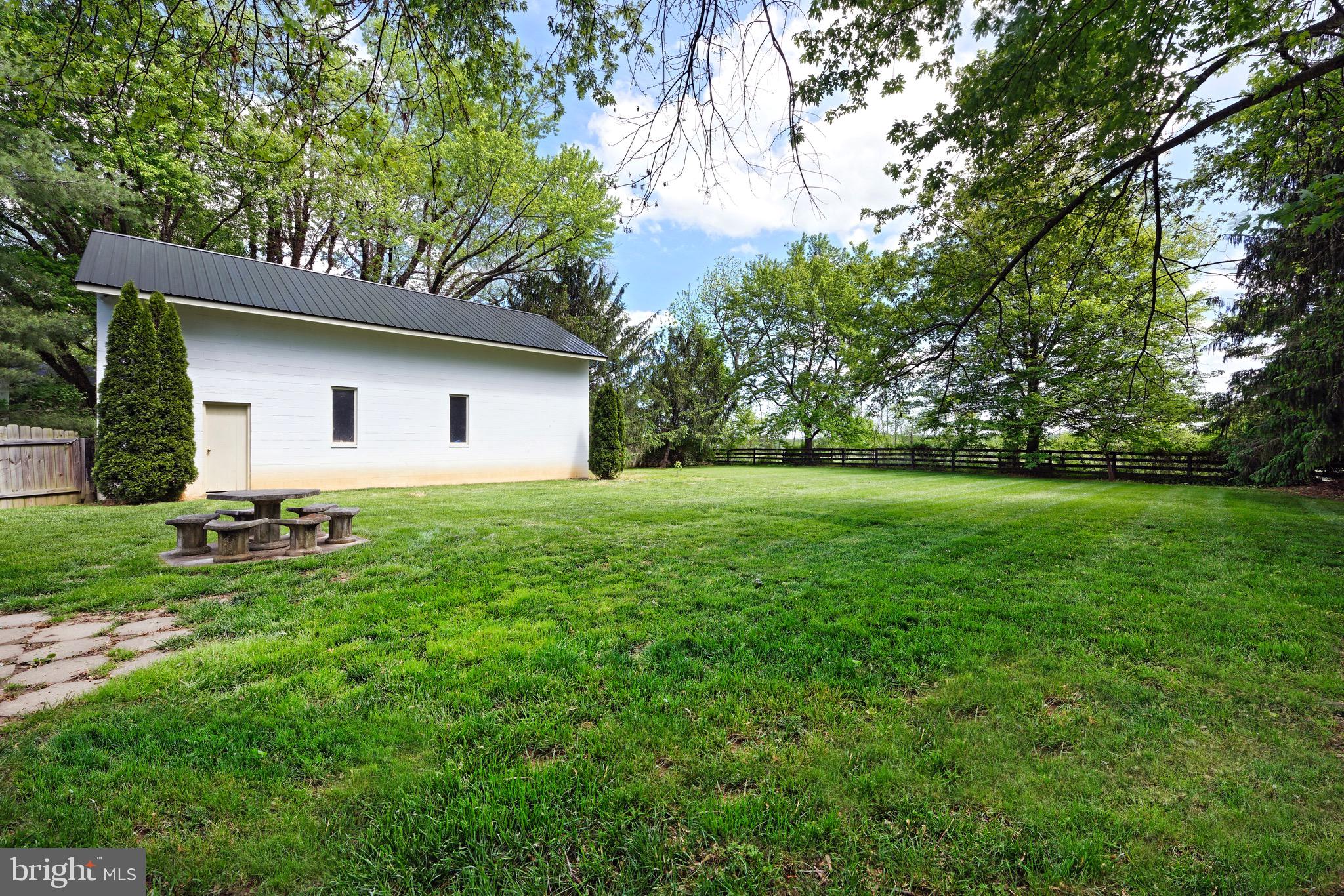 21088 Unison Road Middleburg, VA 20117 - Photo 18 of 66 a house view with a garden space