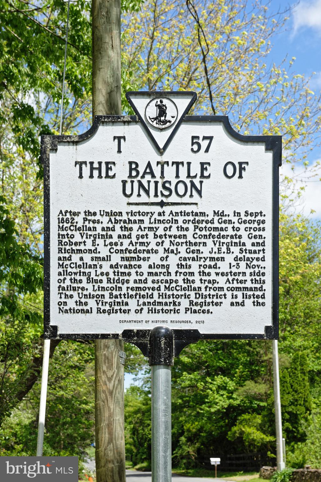 21088 Unison Road Middleburg, VA 20117 - Photo 23 of 66 a view of a sign board with a tree