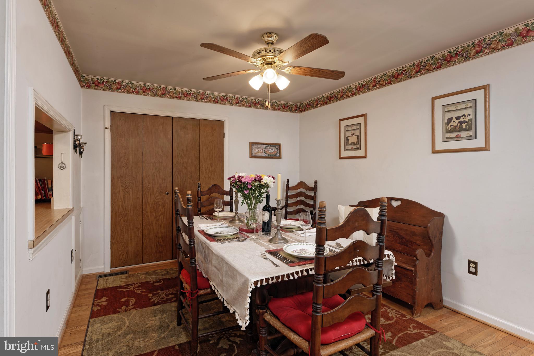 21088 Unison Road Middleburg, VA 20117 - Photo 8 of 66 a view of a dining room with furniture and chandelier