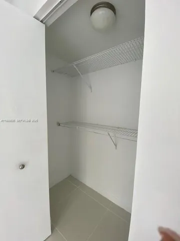 a room with storage and utility