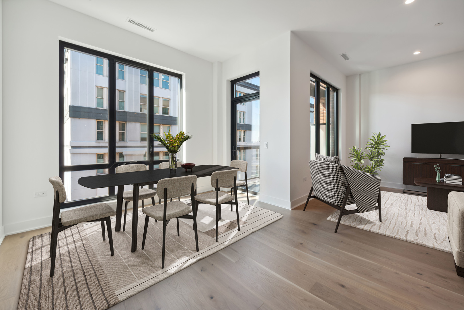 323 South Racine Avenue, Unit 6A Chicago, IL 60607 - Photo 8 of 28 a view of a dining room with furniture window and wooden floor