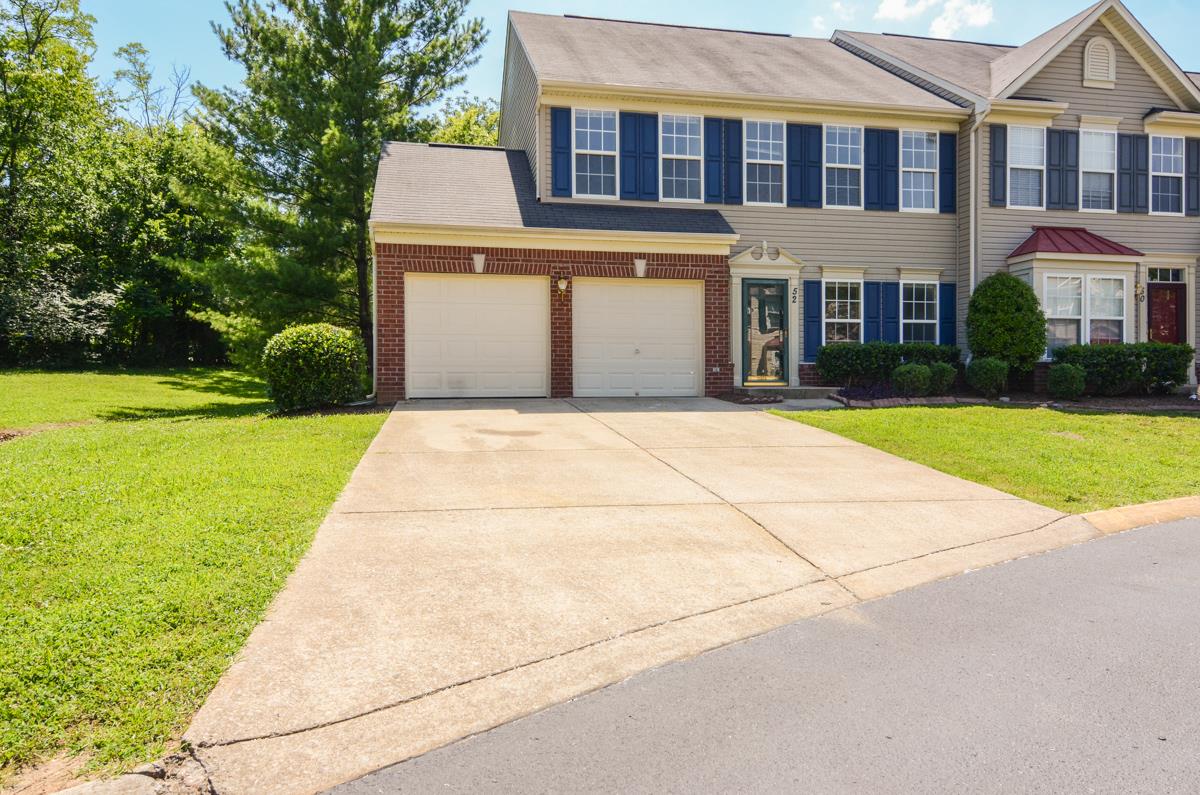 3401 Anderson Road, Unit 52 Antioch, TN 37013 - Photo 18 of 24 a front view of a house with yard and green space