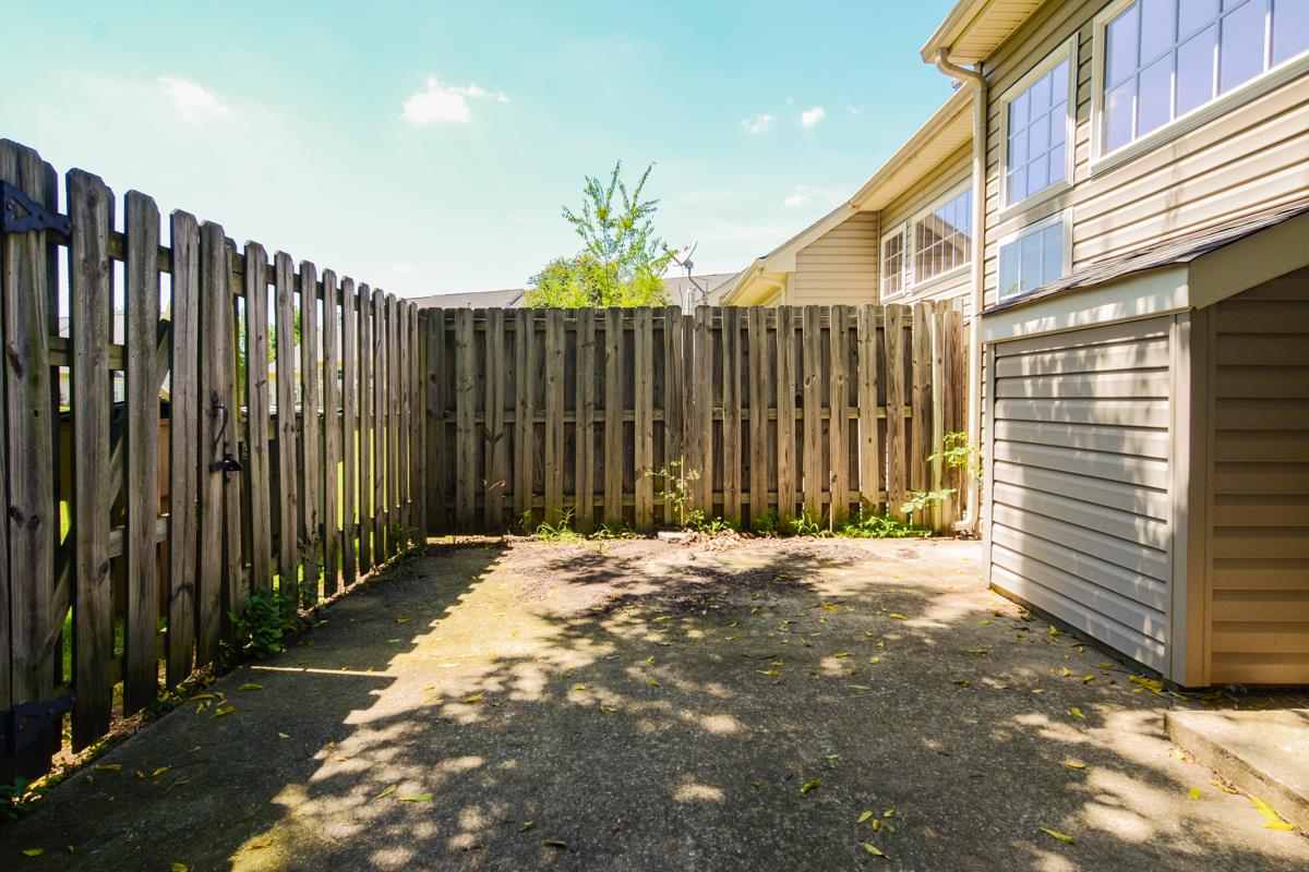 3401 Anderson Road, Unit 52 Antioch, TN 37013 - Photo 22 of 24 a view of a backyard with wooden fence