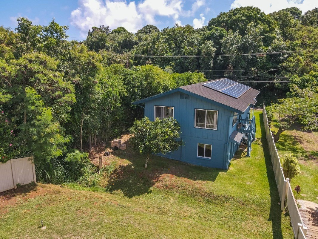 4875 Hauaala Road, Unit 1 Kapaa, HI 96746 - Photo 17 of 19 a front view of a house with a yard