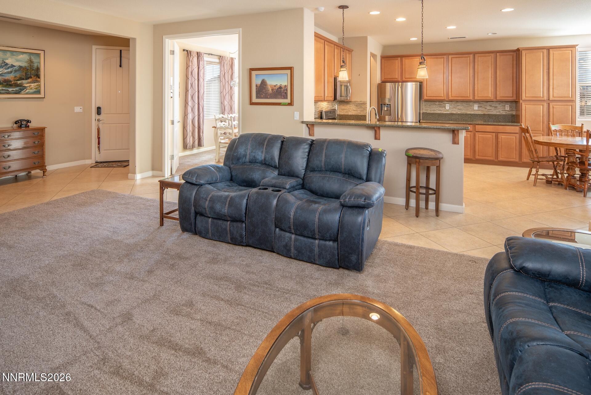 1413 Bluewood Drive Reno, NV 89523 - Photo 12 of 42 a living room with furniture and a large window