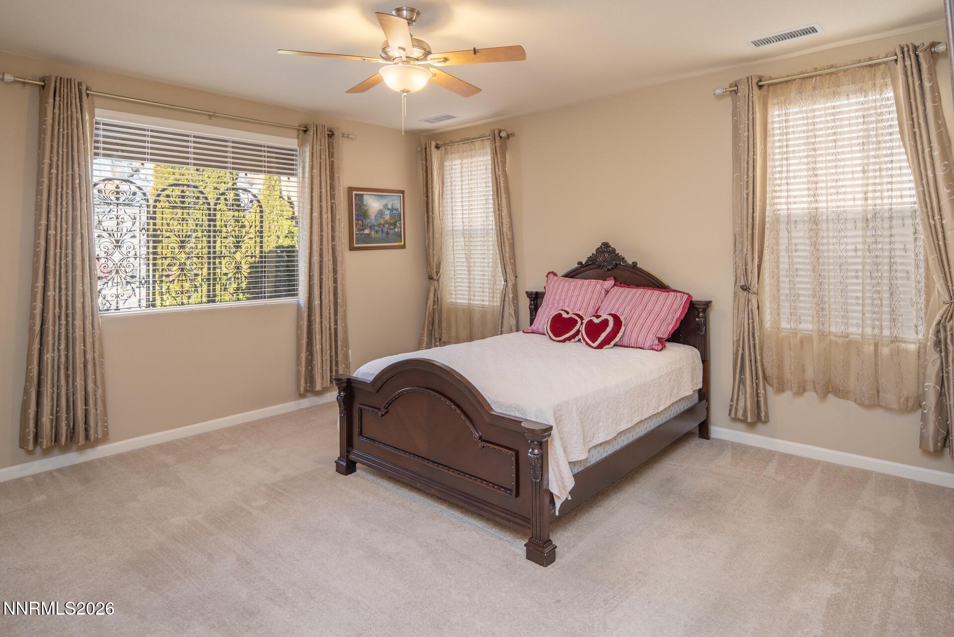 1413 Bluewood Drive Reno, NV 89523 - Photo 18 of 42 a bedroom with a bed and window