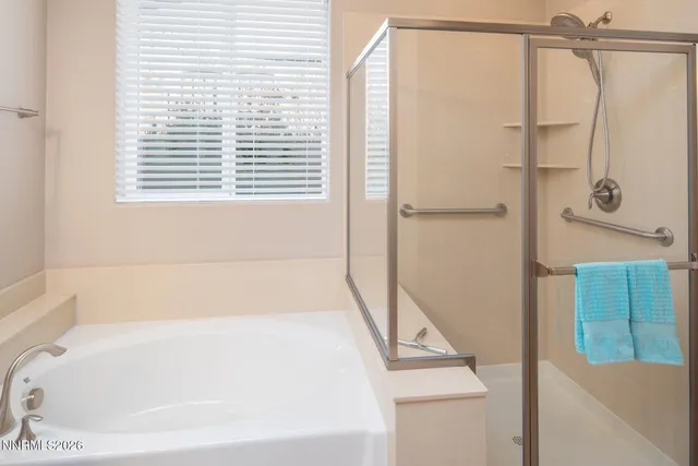 a view of balcony with table and chairs
