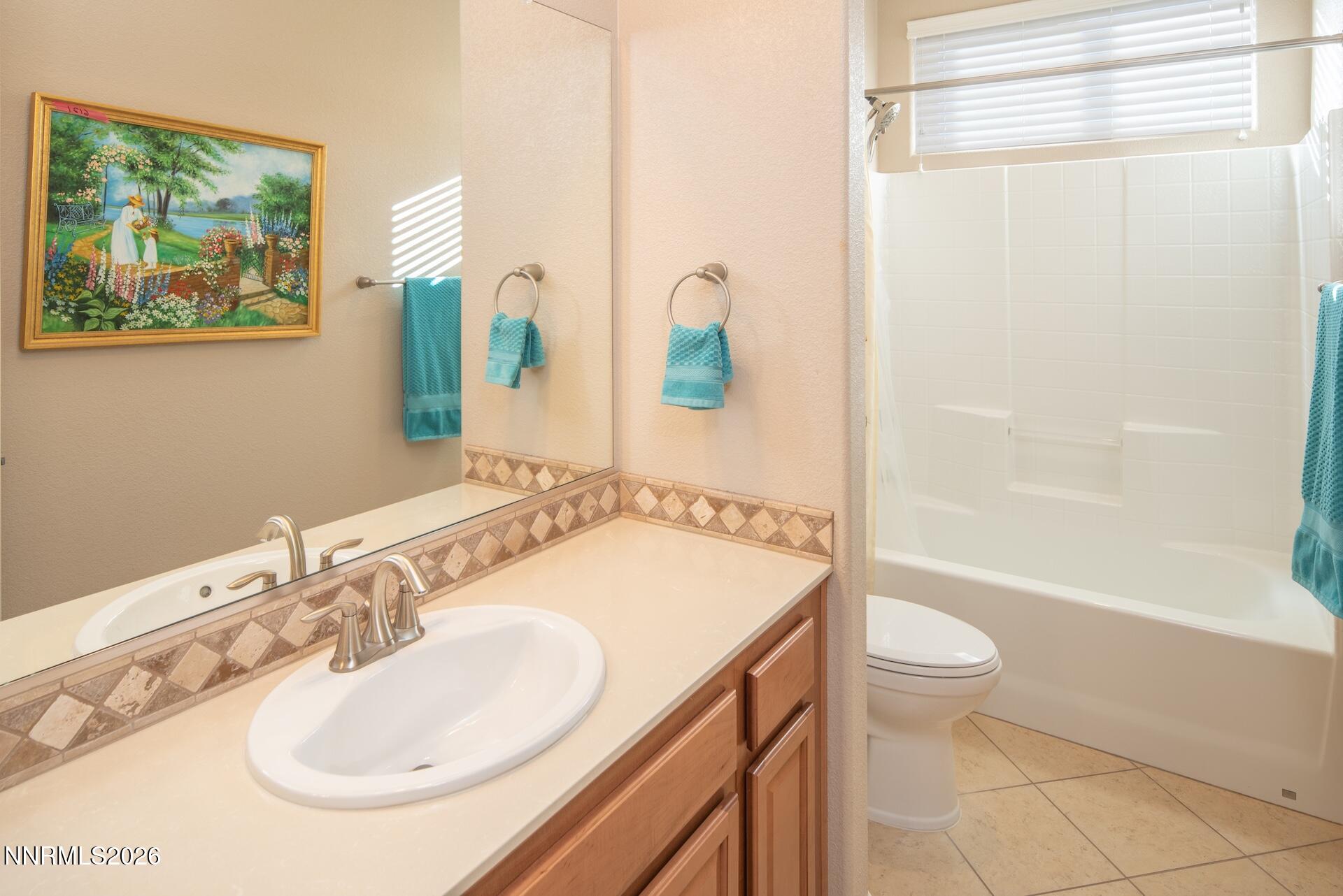 1413 Bluewood Drive Reno, NV 89523 - Photo 24 of 42 a bathroom with a sink toilet and shower