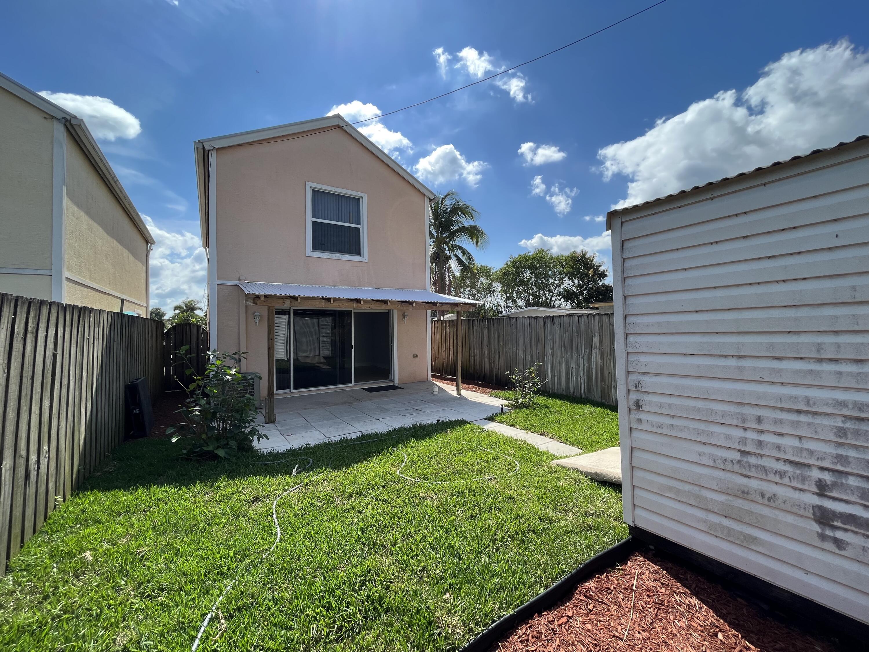 4353 Springfield Street Lake Worth, FL 33461 - Photo 16 of 17 Backyard and shade