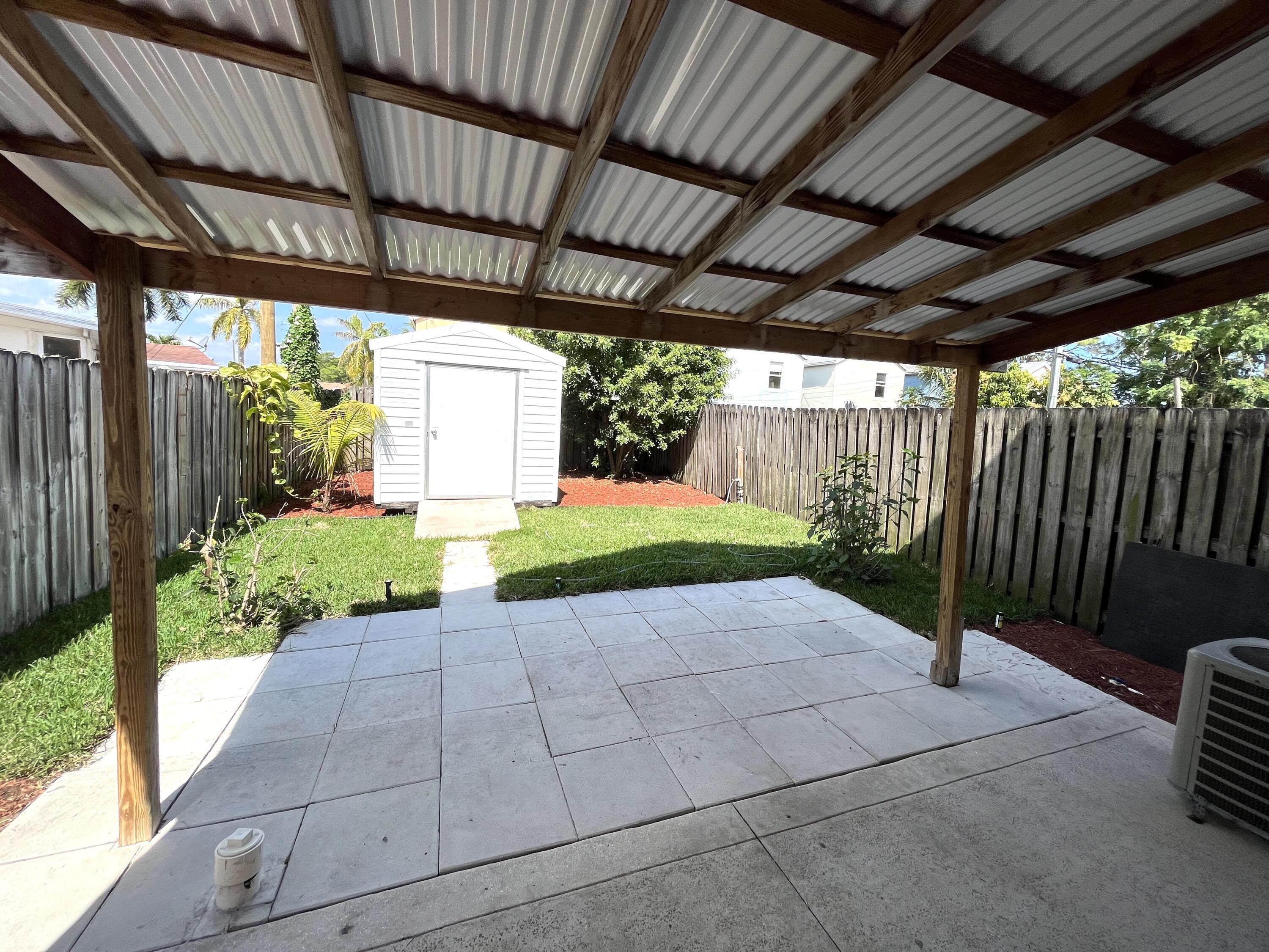 4353 Springfield Street Lake Worth, FL 33461 - Photo 17 of 17 Great covered patio