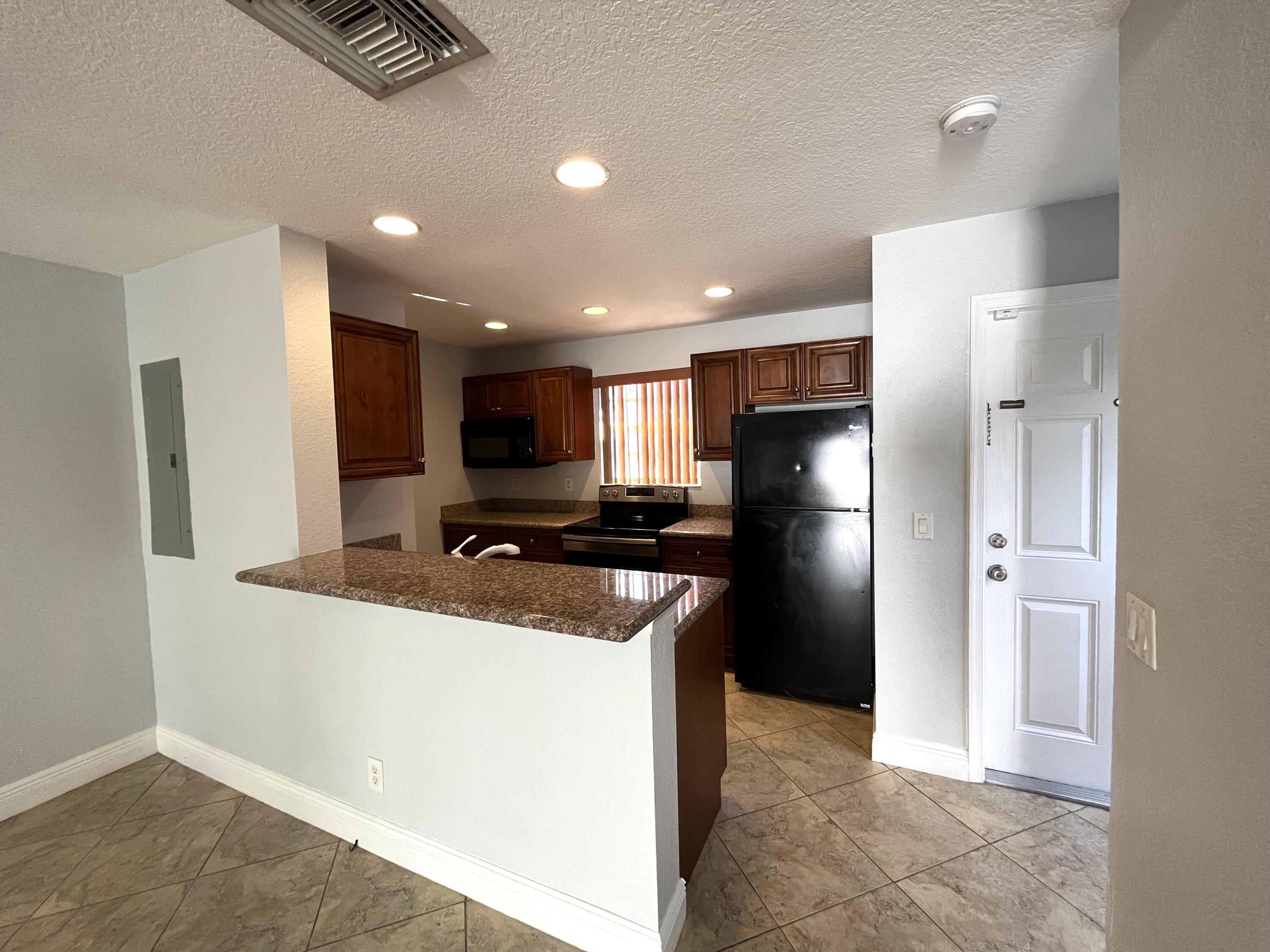 4353 Springfield Street Lake Worth, FL 33461 - Photo 3 of 17 Open kitchen