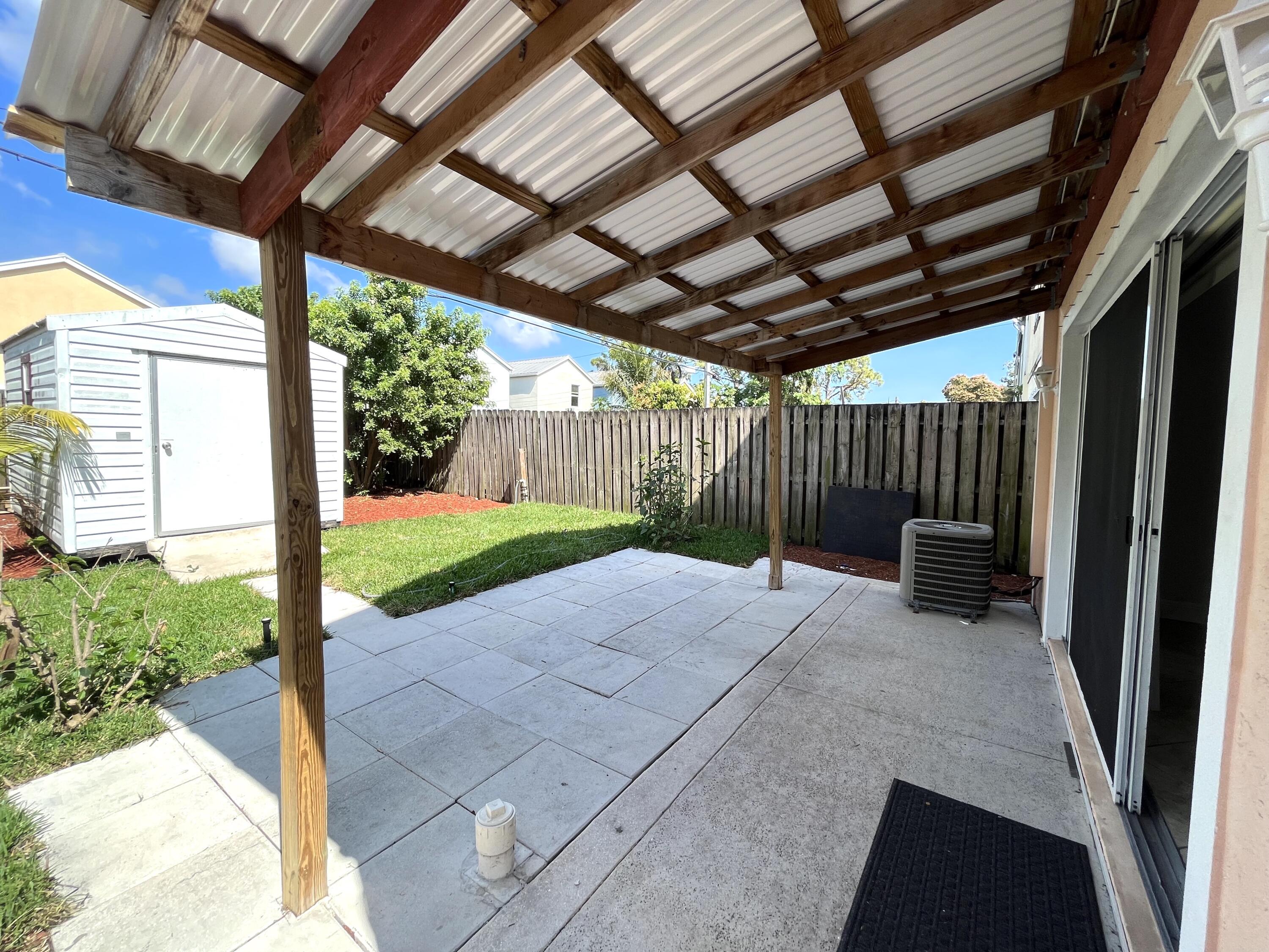 4353 Springfield Street Lake Worth, FL 33461 - Photo 5 of 17 Covered patio