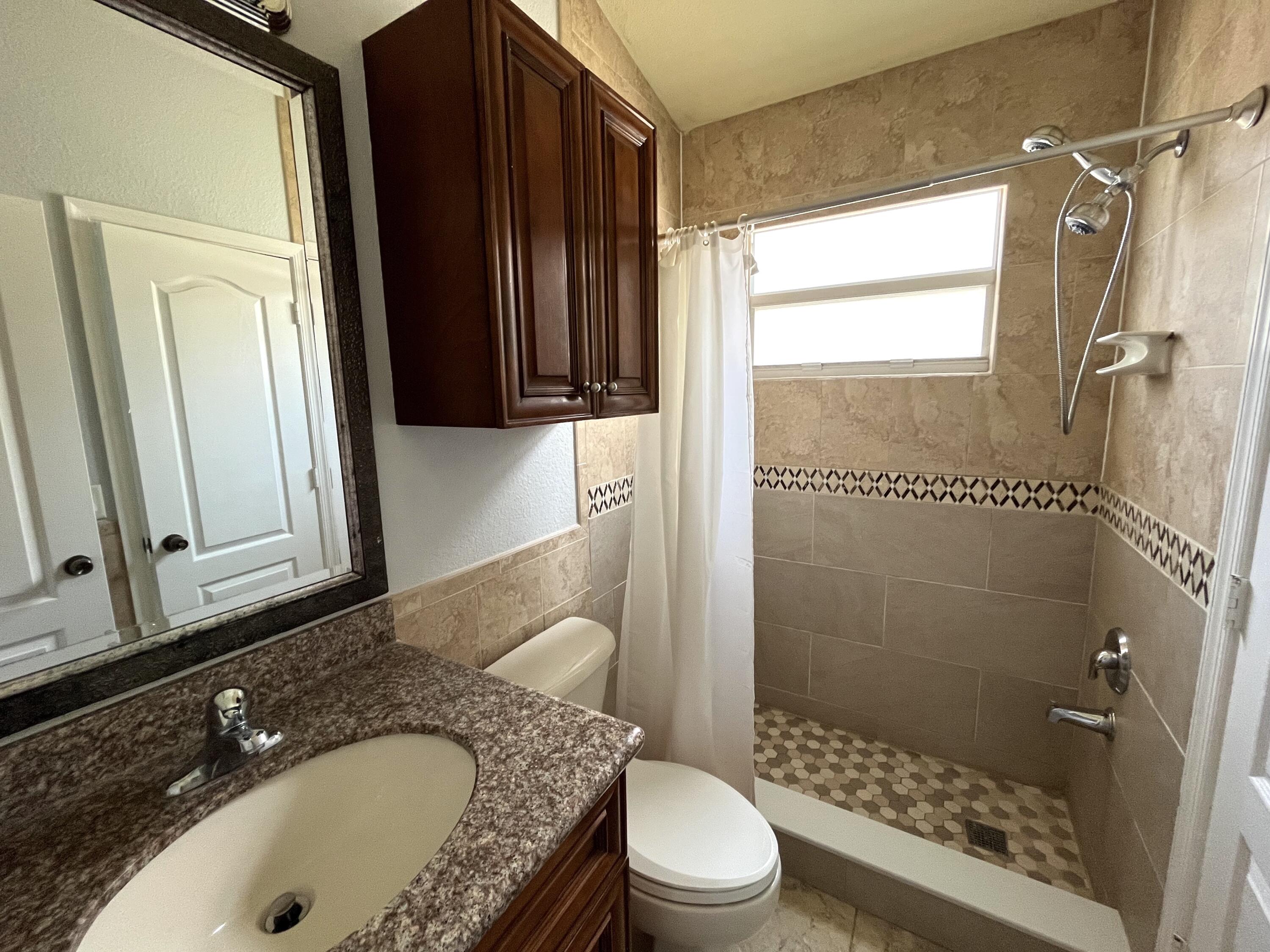 4353 Springfield Street Lake Worth, FL 33461 - Photo 8 of 17 Remodeled bathroom : shower