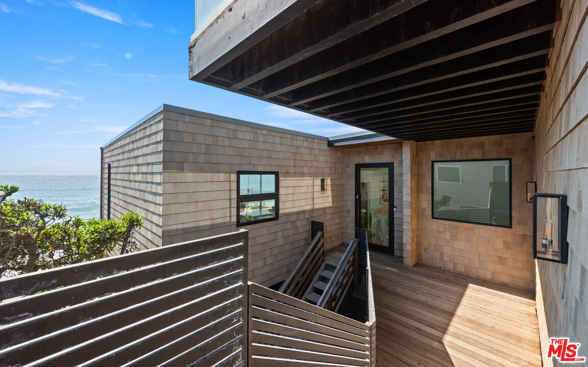 24604 Malibu Road Malibu, CA 90265 - Photo 13 of 17 a view of a balcony with chairs
