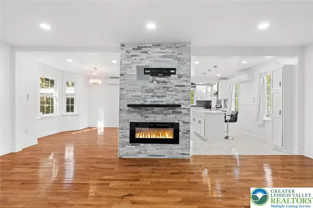 a living room with a fireplace