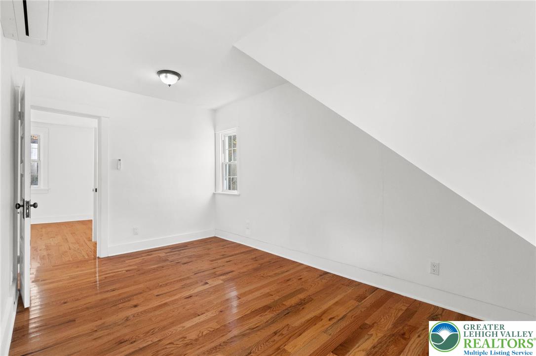 1439 Seidersville Road Bethlehem, PA 18015 - Photo 22 of 55 a view of empty room with wooden floor