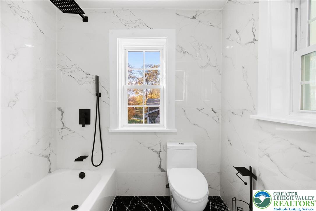 1439 Seidersville Road Bethlehem, PA 18015 - Photo 26 of 55 a bathroom with a toilet and a shower