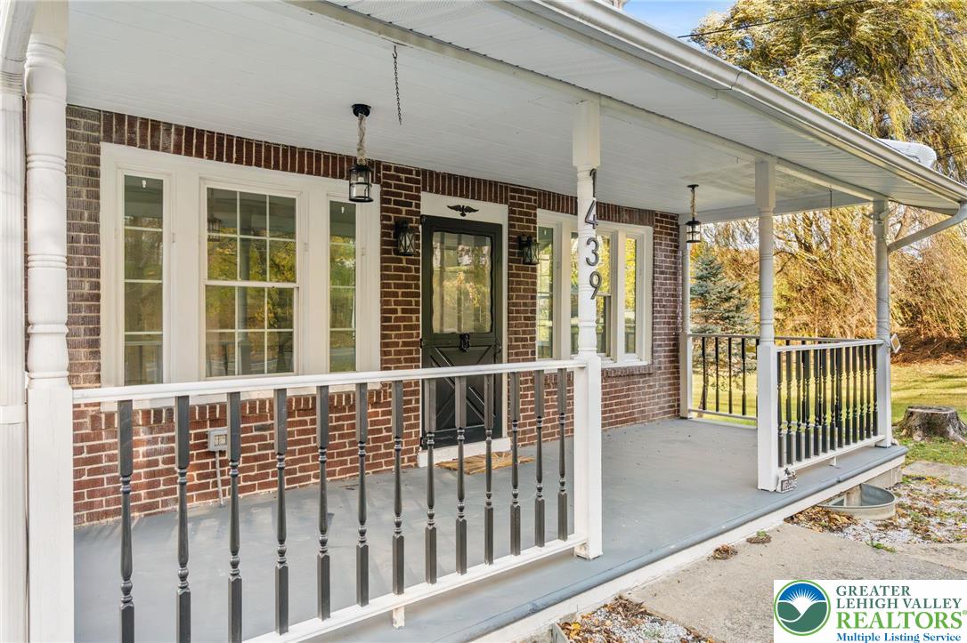 1439 Seidersville Road Bethlehem, PA 18015 - Photo 3 of 55 a porch with a bench