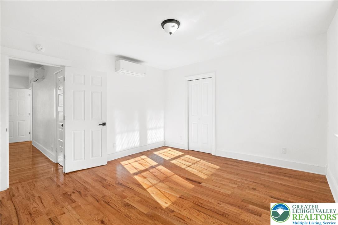 1439 Seidersville Road Bethlehem, PA 18015 - Photo 32 of 55 a view of empty room with wooden floor