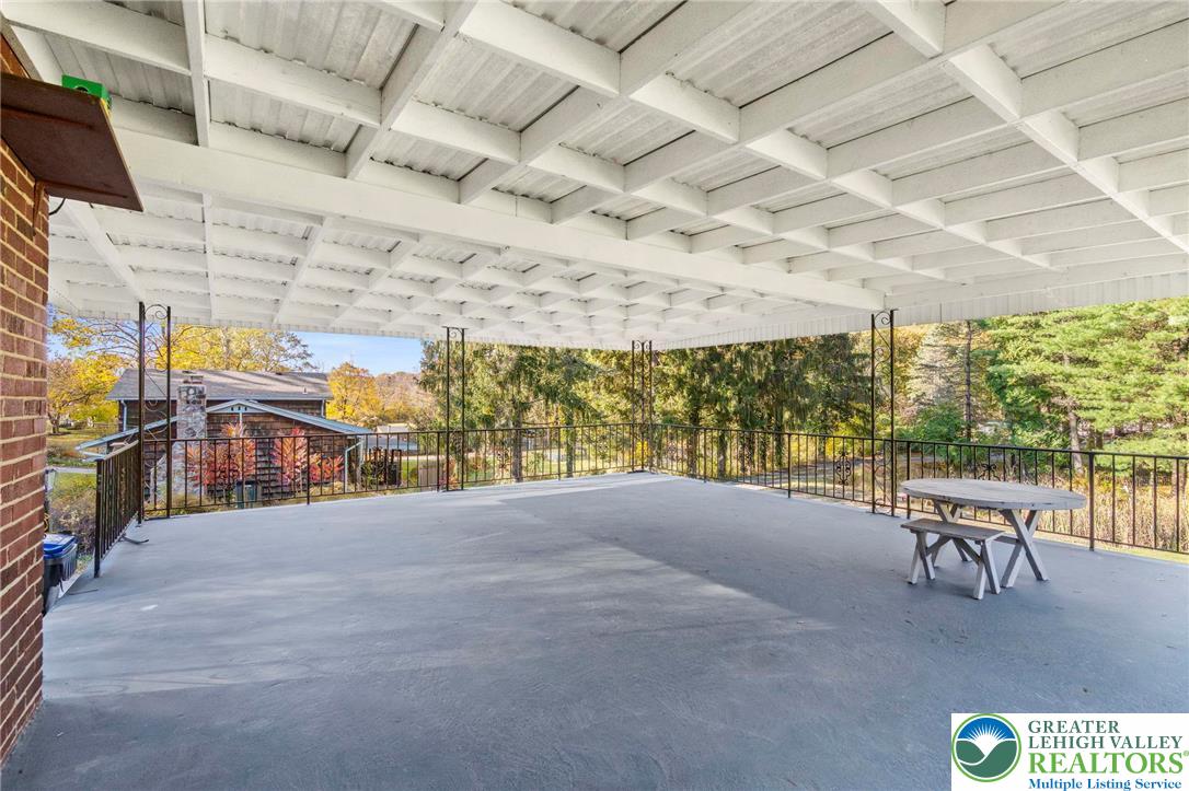 1439 Seidersville Road Bethlehem, PA 18015 - Photo 44 of 55 a view of a patio with a table and chairs