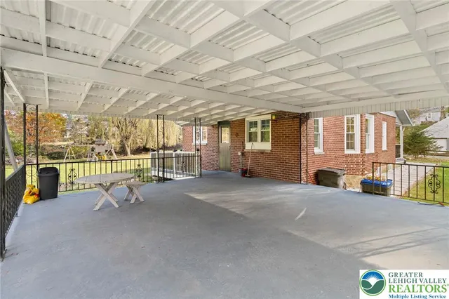 an aerial view of a house with swimming pool