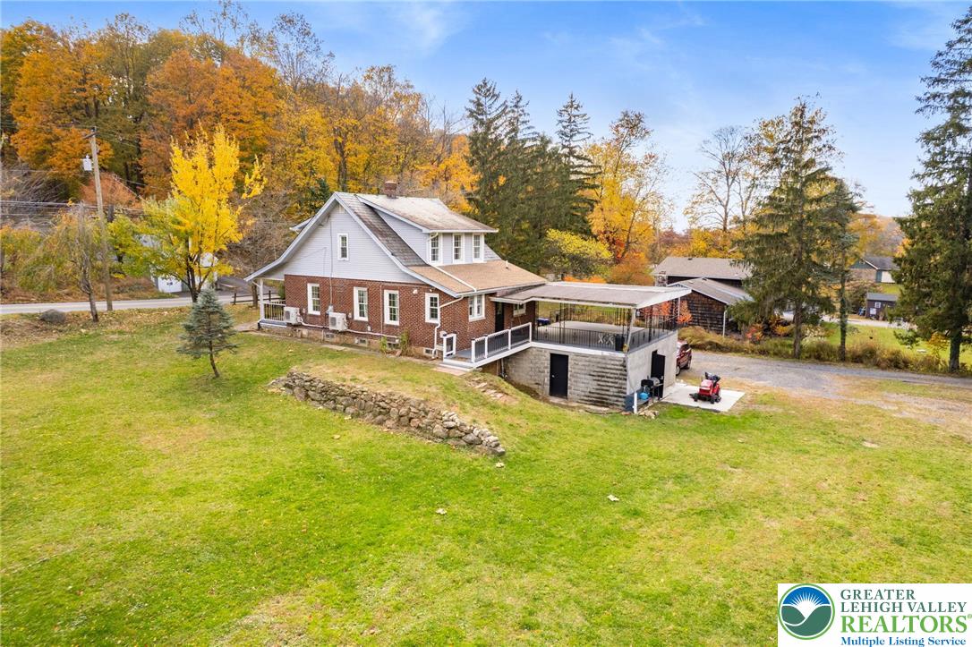 1439 Seidersville Road Bethlehem, PA 18015 - Photo 54 of 55 a view of a house with a big yard and swimming pool