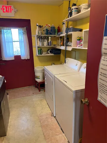 a view of empty room with a flat screen tv