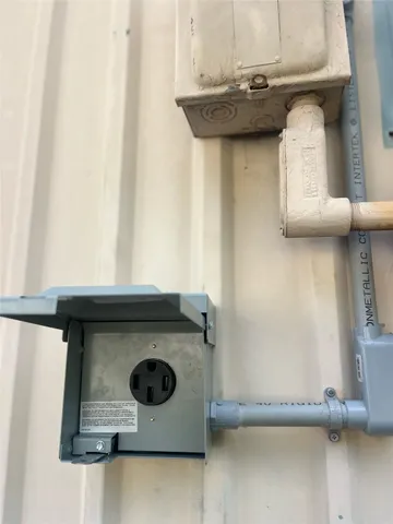 a stove top oven sitting inside of a kitchen