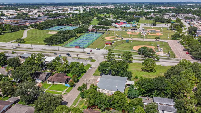 an aerial view of a house with a garden
