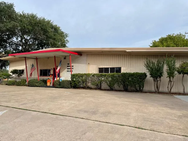 front view of a house with a patio