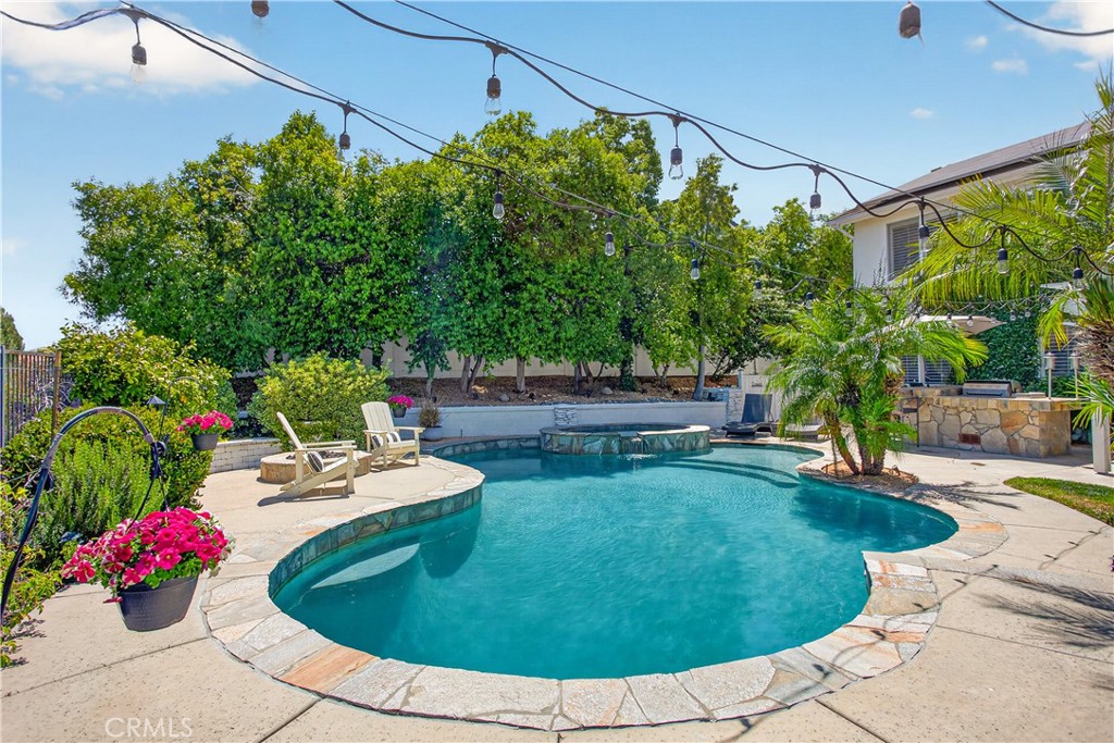 31928 Cercle Chambertin Temecula, CA 92591 - Photo 9 of 74 a view of a backyard with plants and patio