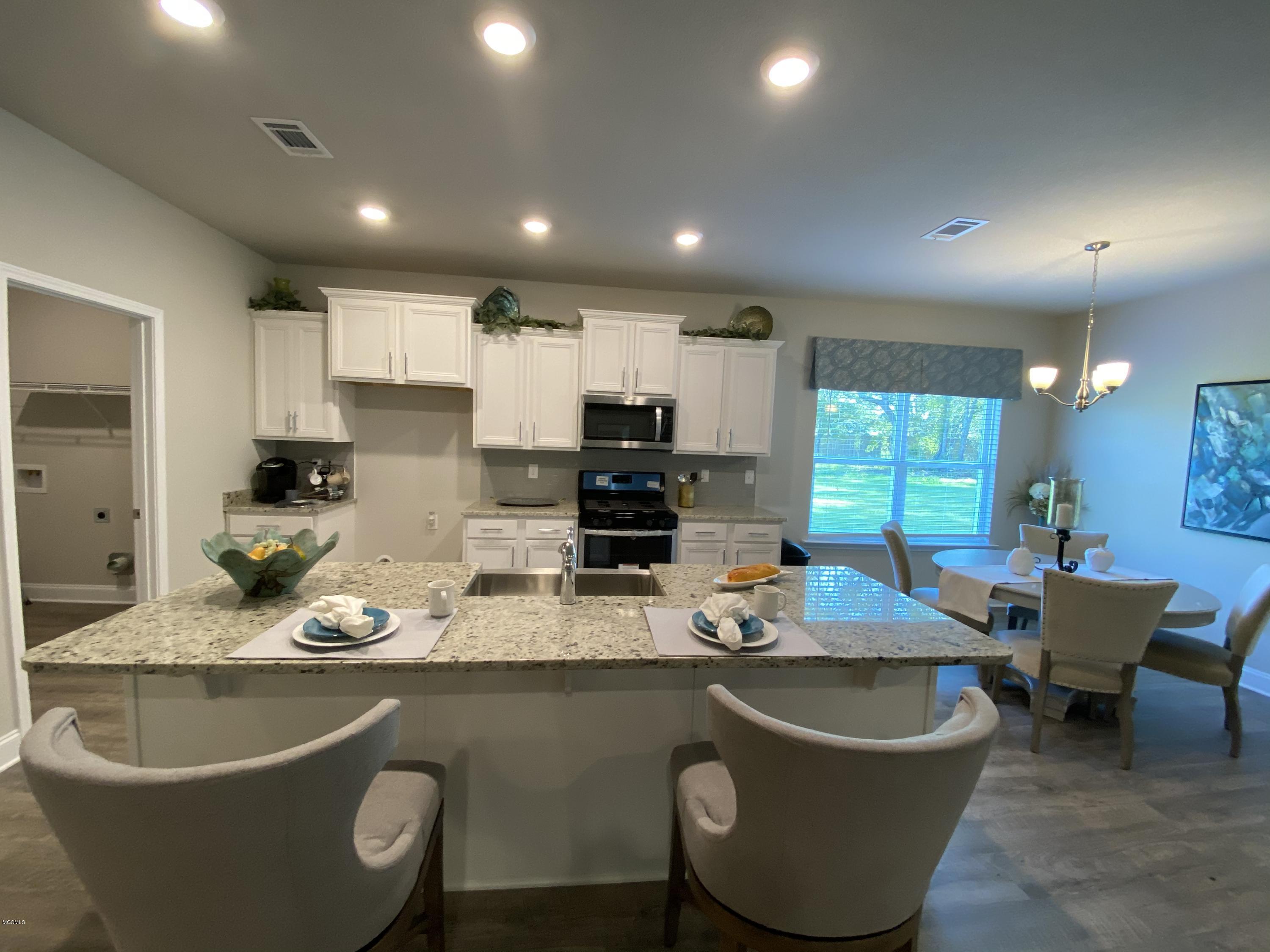 11233 Shorecrest Road Biloxi, MS 39532 - Photo 12 of 27 Destin Kitchen Island and Eat in Kitchen