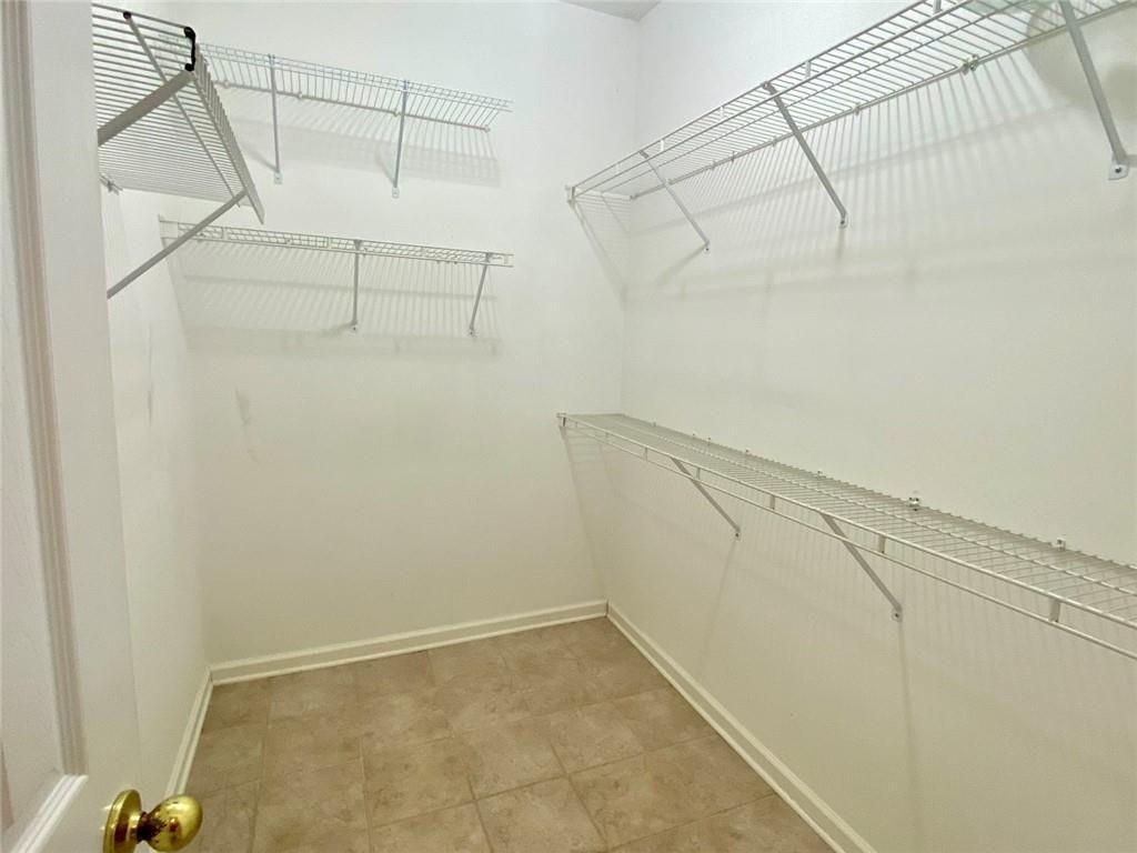 1698 Pin Oak Drive, Unit 129 Dalton, GA 30721 - Photo 20 of 37 a view of a room with racks on the wall