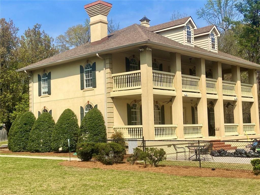 1698 Pin Oak Drive, Unit 129 Dalton, GA 30721 - Photo 34 of 37 a front view of a house with a yard