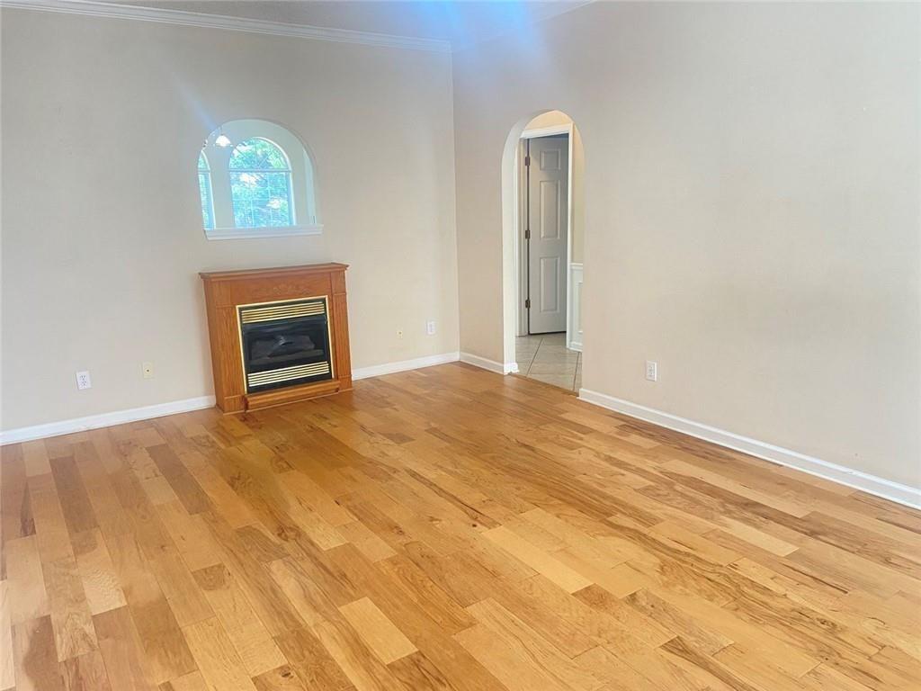 1698 Pin Oak Drive, Unit 129 Dalton, GA 30721 - Photo 10 of 37 a view of empty room with a fireplace
