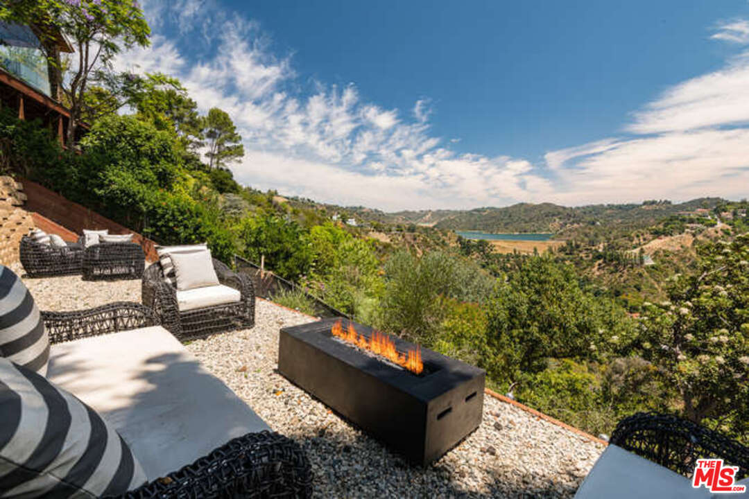1374 Stradella Road Los Angeles, CA 90077 - Photo 2 of 47 a view of a patio in the backyard