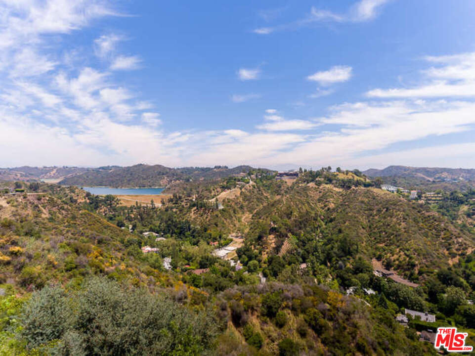 1374 Stradella Road Los Angeles, CA 90077 - Photo 43 of 47 a view of a city with mountains in the background
