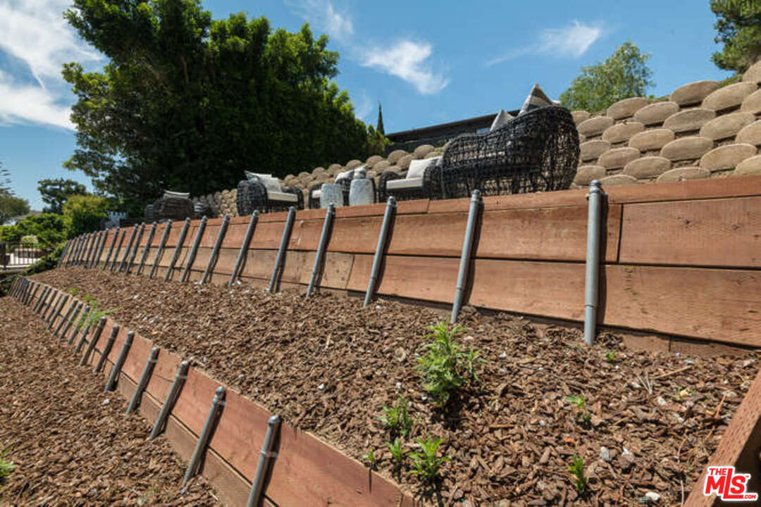 1374 Stradella Road Los Angeles, CA 90077 - Photo 44 of 47 a view of a backyard with sitting area