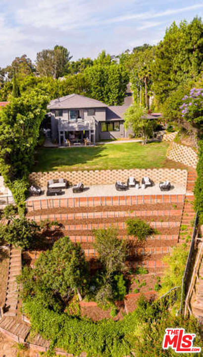 1374 Stradella Road Los Angeles, CA 90077 - Photo 45 of 47 a view of a lake with houses