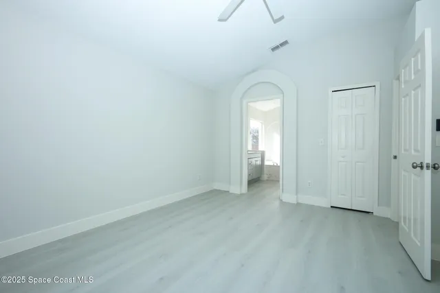 a view of a livingroom with wooden floor