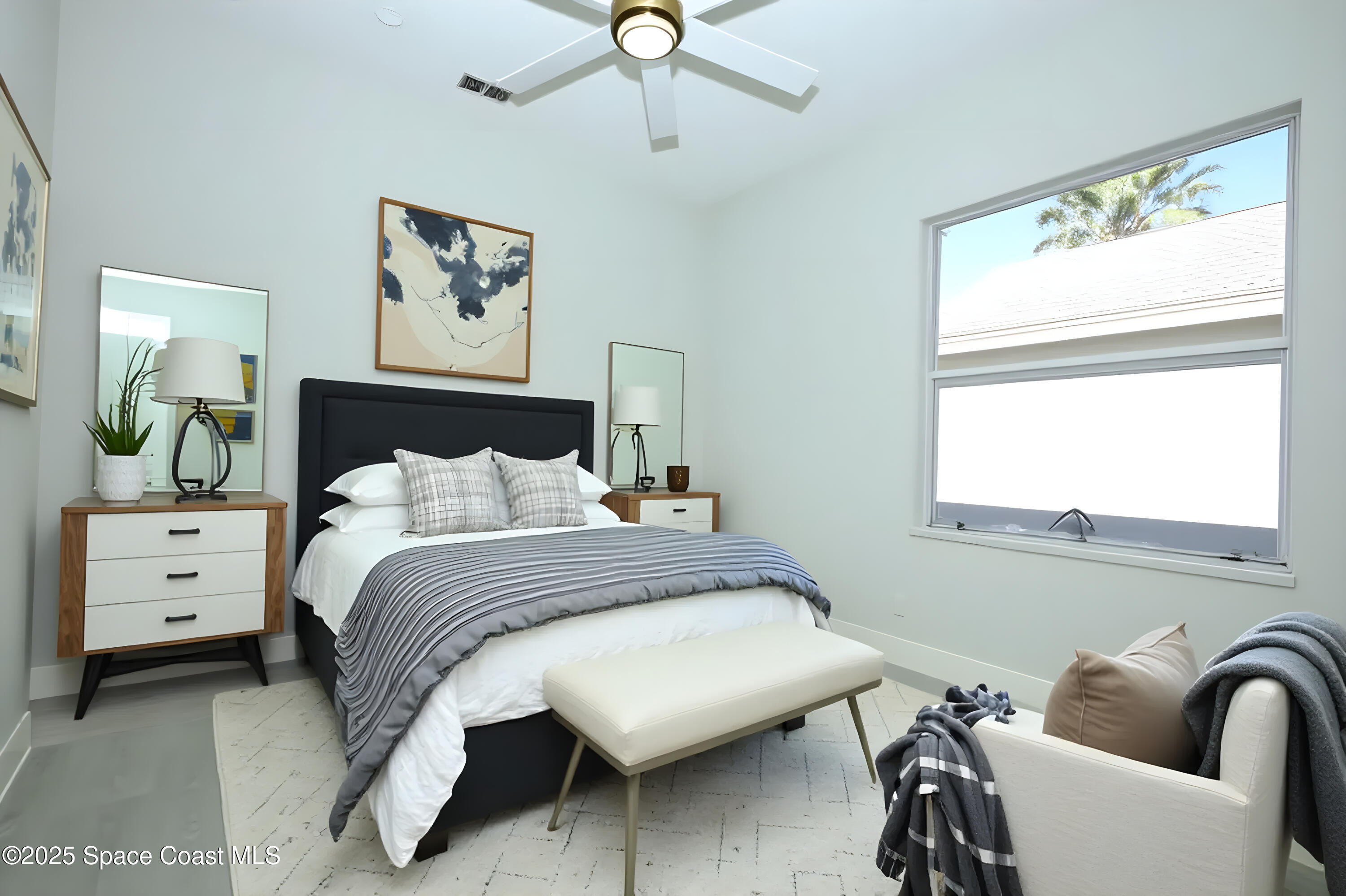 3700 Becontree Place Oviedo, FL 32765 - Photo 30 of 39 a bedroom with a bed and a couch