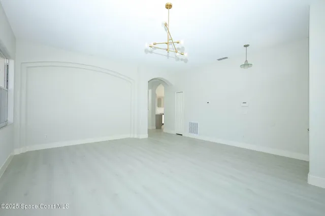 a view of a room with an empty space