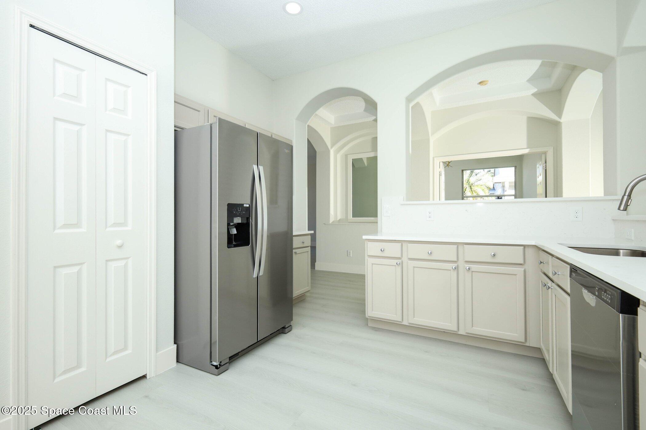 3700 Becontree Place Oviedo, FL 32765 - Photo 8 of 39 a spacious bathroom with a granite countertop sink and a mirror