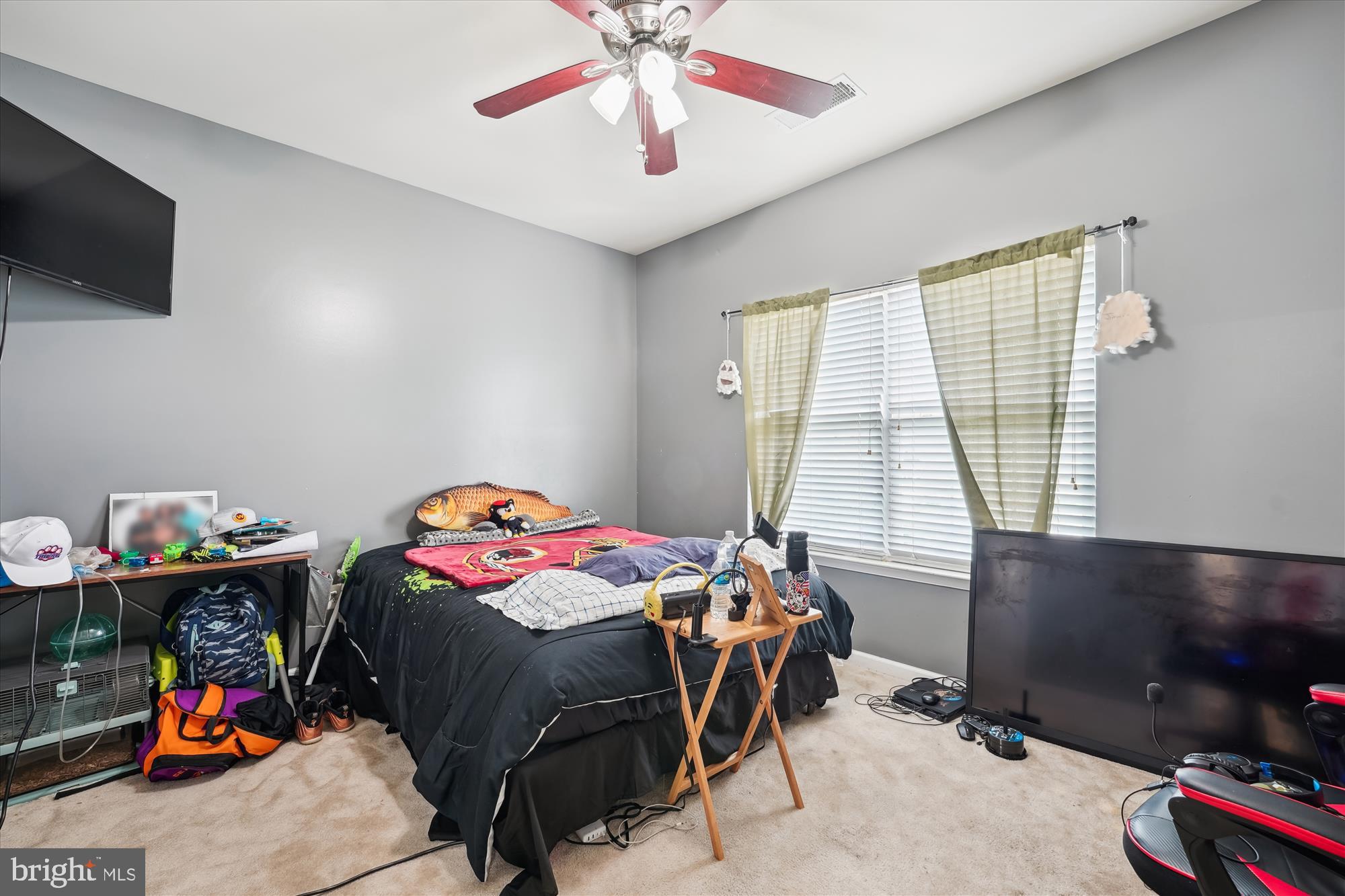 7306 Sudley Avenue Brandywine, MD 20613 - Photo 14 of 46 a bedroom with a bed and a window